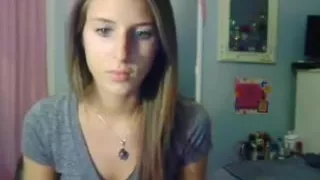 Cute small tittied blonde teasing on cam