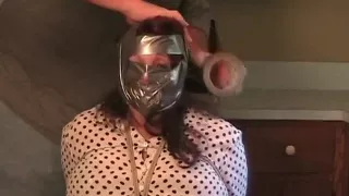 Elane bound in the kitchen (big blindfold).