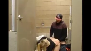 Couple fuck in public bathroom