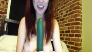 Big tits girl suck cucumber
