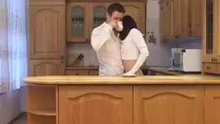 Couple have sex in the kitchen