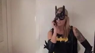 Fuckbuddy wearing batman costume gives a footjob