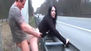 I saw two people banging next to the highway.