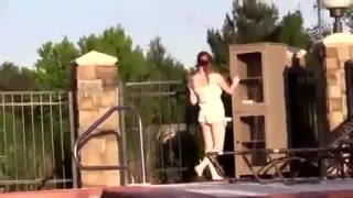 Amanda Love shows off near the pool