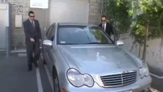 Old man wearing sunglasses as he gets his goods