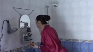 Brunette does makeup while slave worship her ass