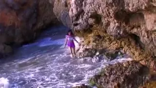 Nice beach sex with a French curly brunette taking things in her own hands jerking it and receiving a nice hot load on her face