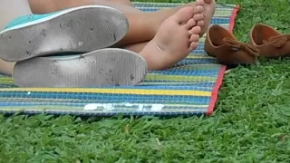 Candid asian soles in park