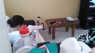 My cousin sitting and shoeplaying