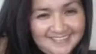 Fat brunette cutie is smiling to the camera