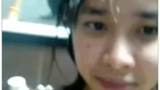 Cutie rubs her hairy Japanese pussy on chat-roulette, while watching a horny couple enjoying a hot oral sex.