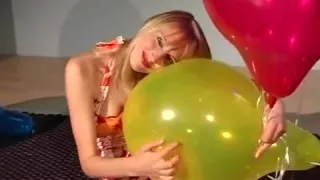 Sexy blonde destroy yellow balloon
