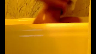 Asian-American tgirl shows her bubble butt in her bedroom