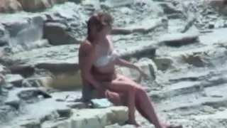 immature lovers couple on beach