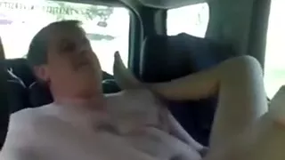 Couple shagging on the backseat