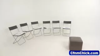 Dressed art students mock nude model