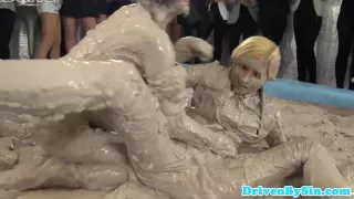 European hotties enjoy wrestling in mud