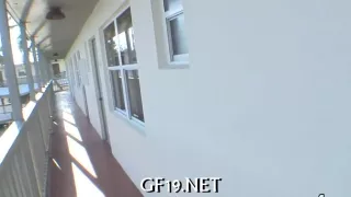 Funny teen plays with big tool