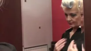 Perverted granny masturbates on the bed