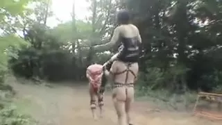 Plays with slaves outdoors