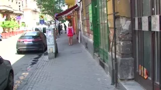 Public oral pleasure from golden-haired in red costume