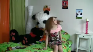 Joy fucking with a large toy bear