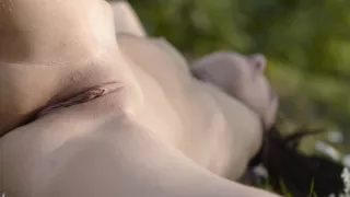 Solo girl playing lascivious striptease