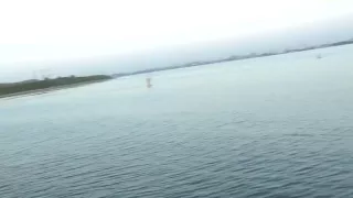 Girl in fishnets blowing