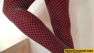 Distorted nylon mask face and stunning legs