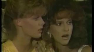Two beautiful retro babes in their first lesbian video
