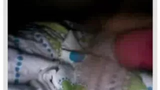 Arousing amateur slut tempts with her ass in bed on cam