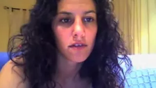 Busty curly haired Brazil camsluts fingers her pussy