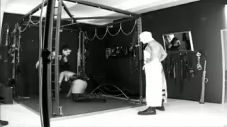 Latex mistress humiliates and dominates slaves