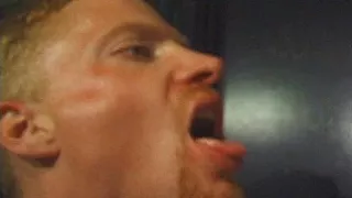 Submissive gay licks the piss from his master's boots