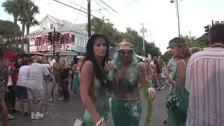 Permissive chicks wear body paint for carnival