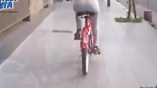 Most Amazing Ass Riding a Bike with a String Thong and Camel