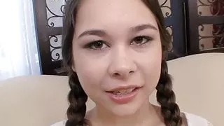 Pigtailed teen Kira Sinn eagerly taking cum facial