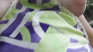 Touching her tits outdoor