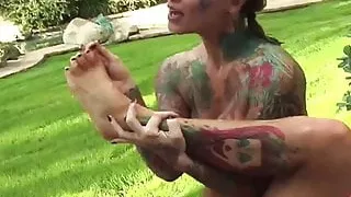 Beautiful tattooed blonde milf - bathing in the garden