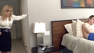 Big boobed blonde milf in stockings and a garter