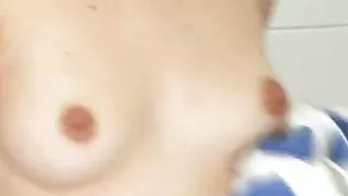 redhead girl plays in shower