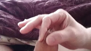 wife sliding my foreskin up & down with her fingers