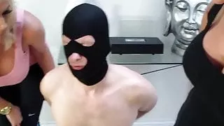 gimp is punished by 2 mistress