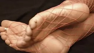 Pink fishnet feet & soles tease