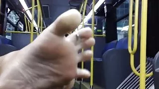 feet and soles on the bus