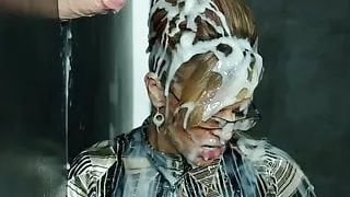 Sophia getting covered in bukkake at the gloryhole