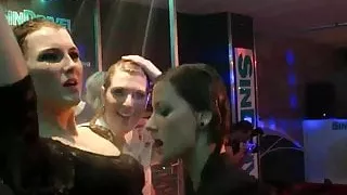 Wet girls dancing erotically in a club
