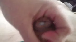 wife wanking a messy cum load from my uncut cock