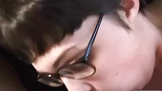 Busty brunette Vivian Lavey swallows a stiff cock