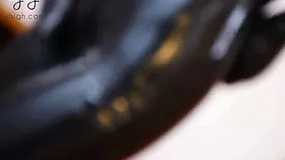 Girl fits latexcatsuit shows her ass and extreme high heels